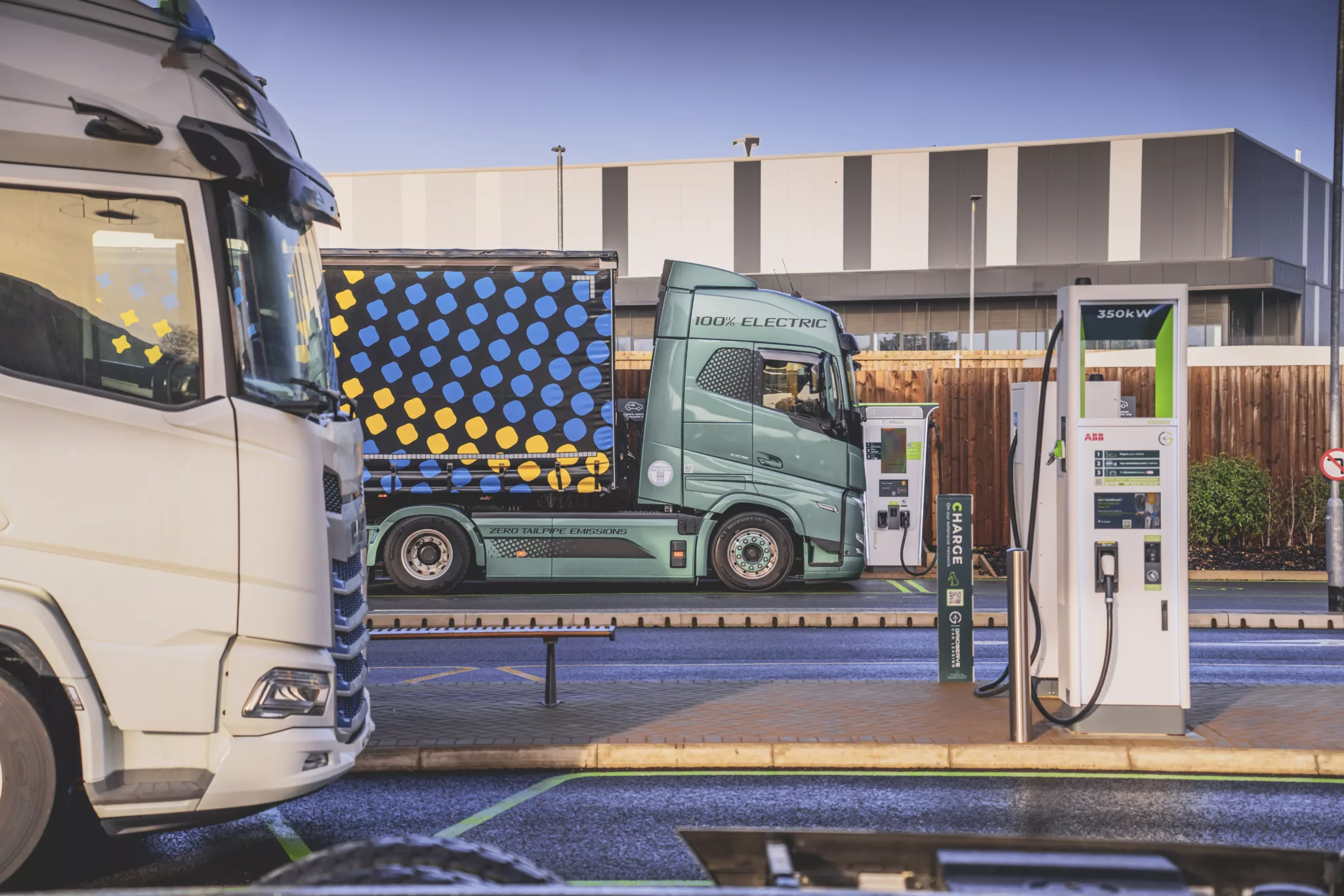 electric trucks charging with GRIDSERVE 