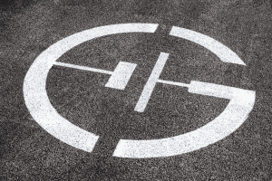 GRIDSERVE logo on the floor of a charging facility