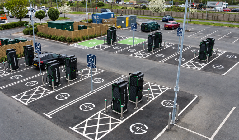 A birds-eye view of GRIDSERVE charging bays at Extra Cobham Super Hub