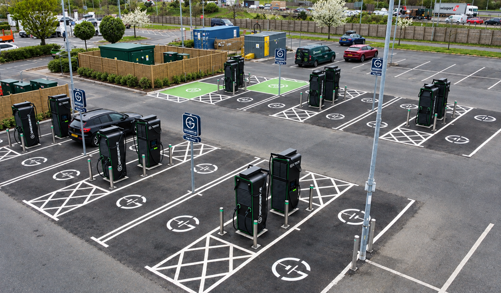 A birds-eye view of GRIDSERVE charging bays at Extra Cobham Super Hub